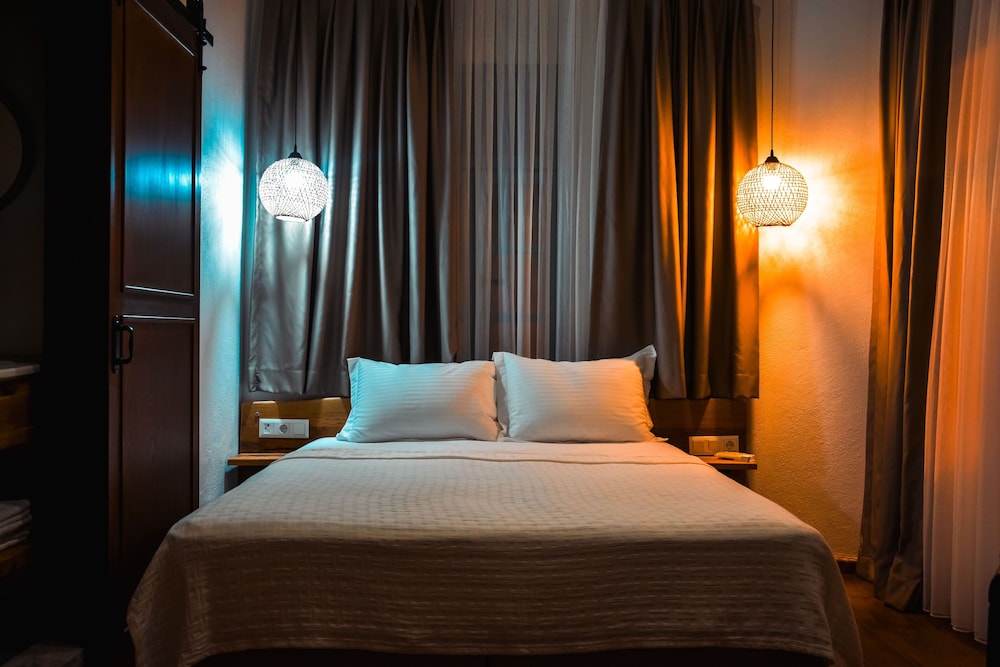 Exclusive Quadruple Room, City View photo 3