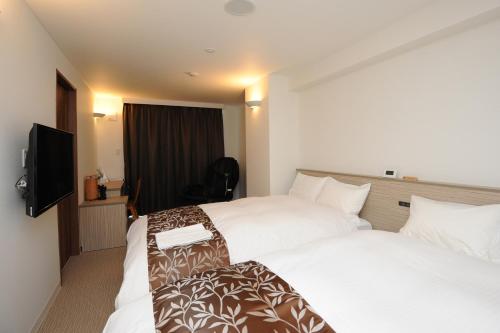 Twin Room - Non-Smoking - Photo 5