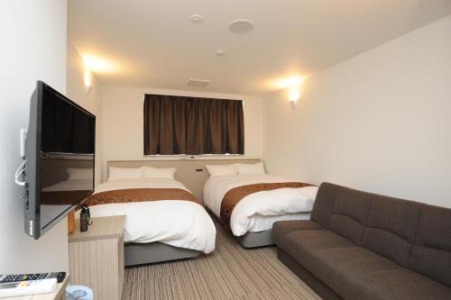 Twin Room with Bathroom - Smoking - Photo 1