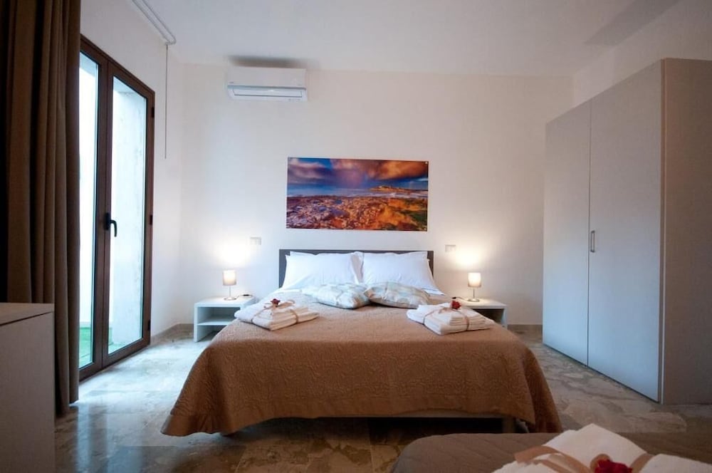 Deluxe Quadruple Room, Multiple Beds, Patio
