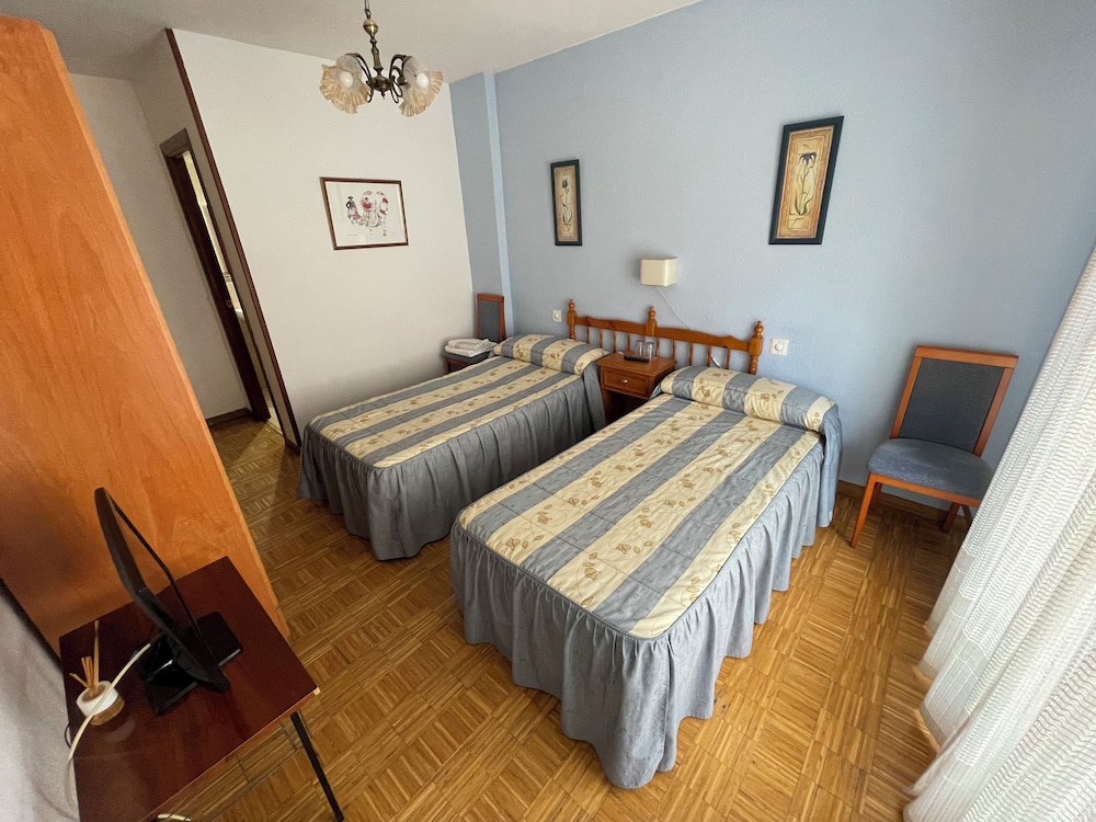 Habitación Doble, 2 Camas Individuales, Baño Privado, Vista a la Ciudad