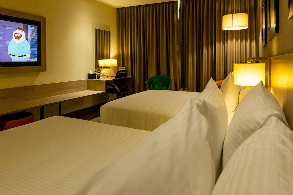 Deluxe Quadruple Room, 2 Queen Beds, Non Smoking - Photo 1