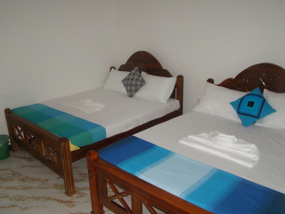 Deluxe Triple Room, 1 Bedroom, Garden View photo 1