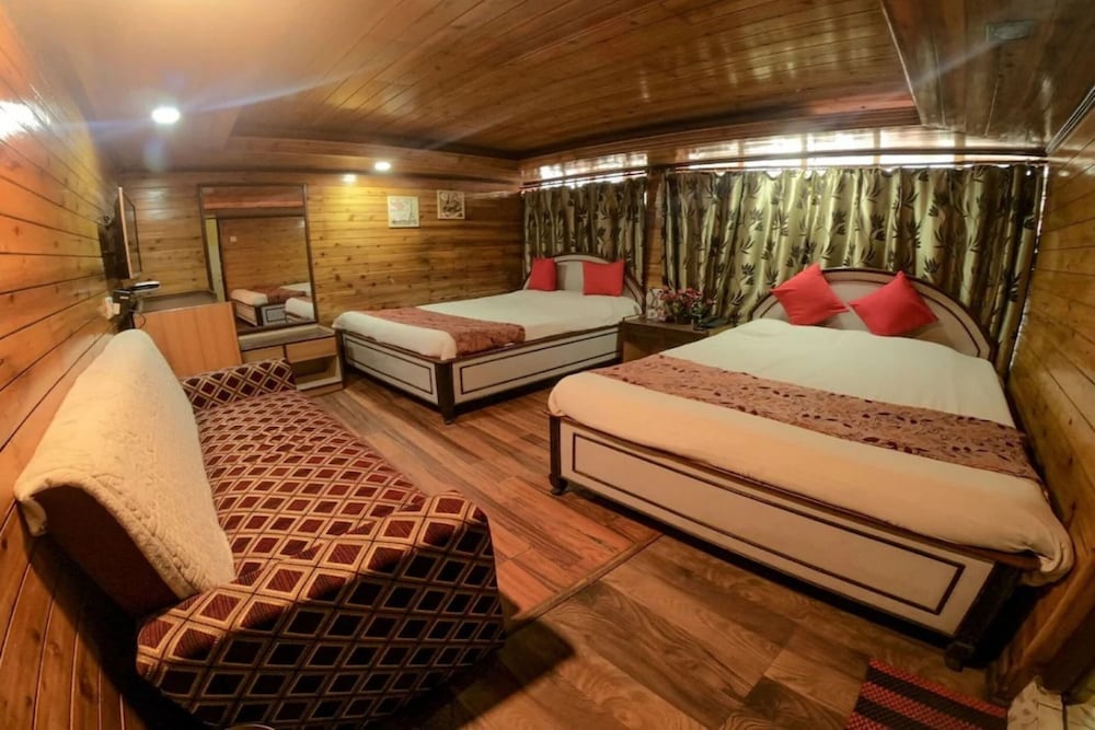 Deluxe Quadruple Room - Photo 4