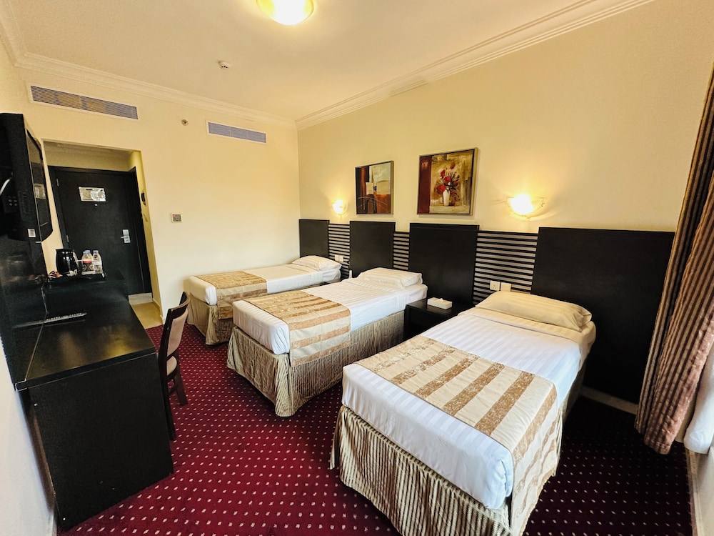 Deluxe Triple Room
