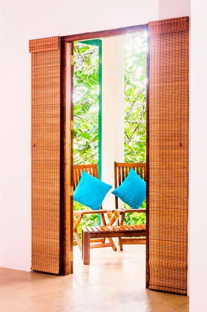 Deluxe Triple Room, Garden View photo 3