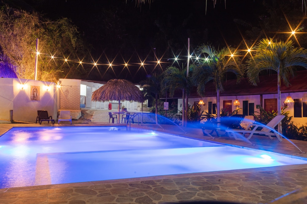 Basic Room, Multiple Beds, Private Bathroom, Pool View photo 3