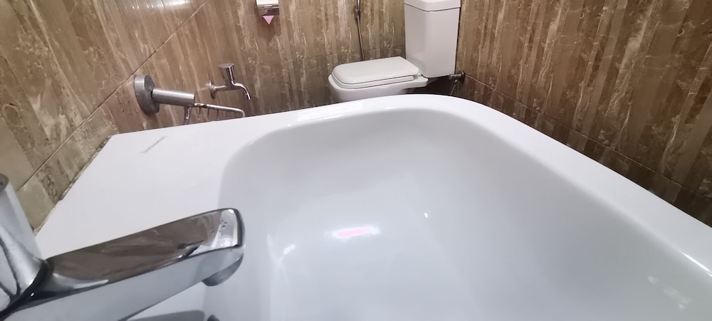 Deluxe Quadruple Room, Garden View, Corner photo 3