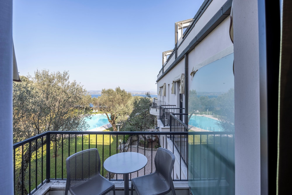 Double or Twin Room, Balcony, Pool View - Photo 10