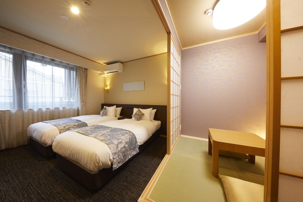 Deluxe Twin Room - Photo 2