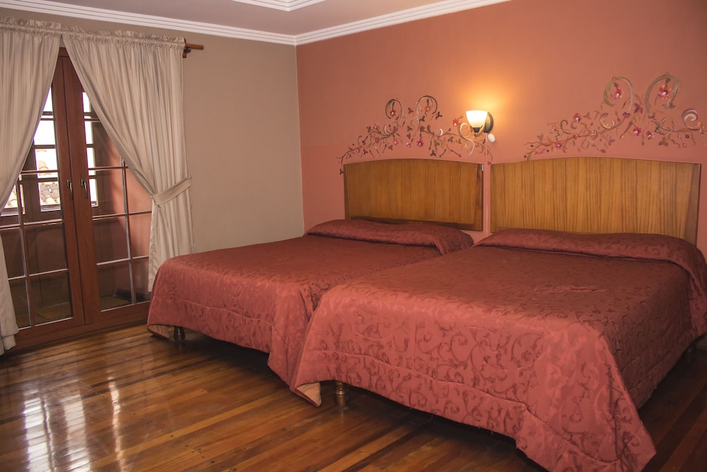 Superior Quadruple Room, 2 Double Beds, Non Smoking, City View photo 1
