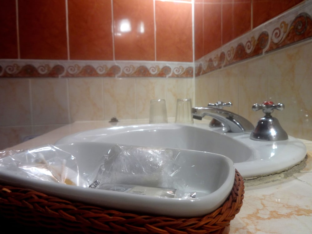 Deluxe Quadruple Room, 1 Bedroom, Private Bathroom, Courtyard View photo 3