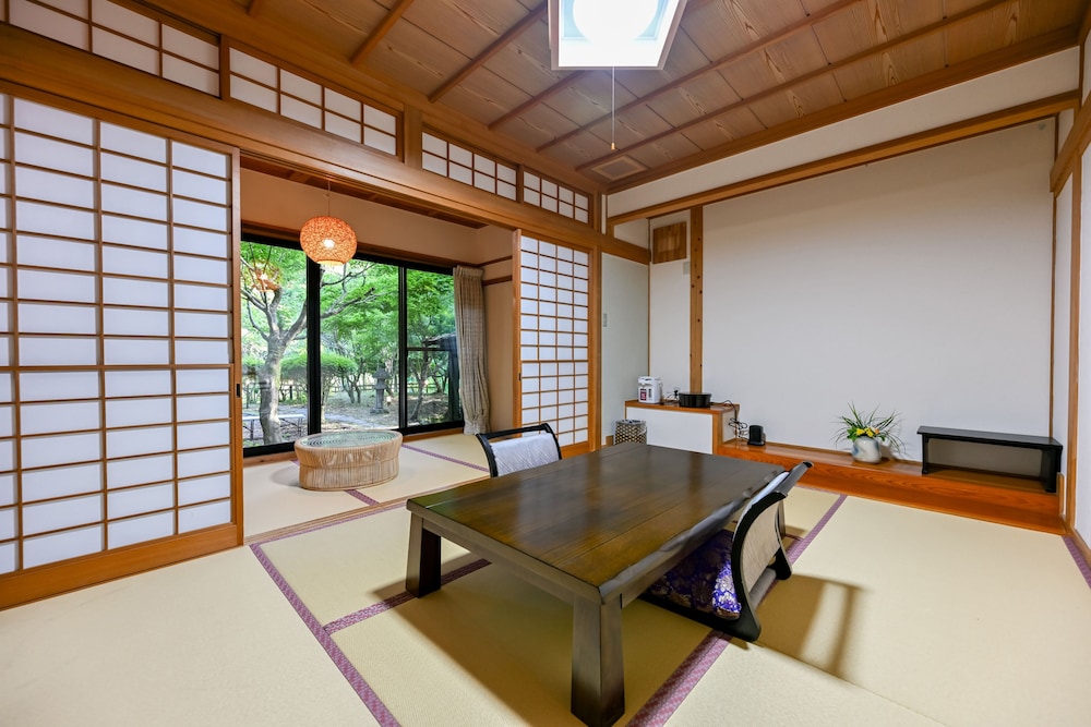 Comfort Quadruple Room, Garden View