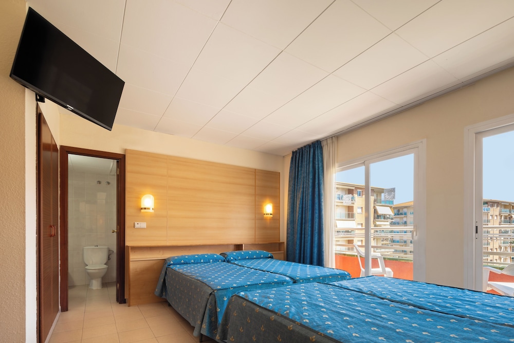 Habitación Cuádruple (2 Adultos + 2 Niños)