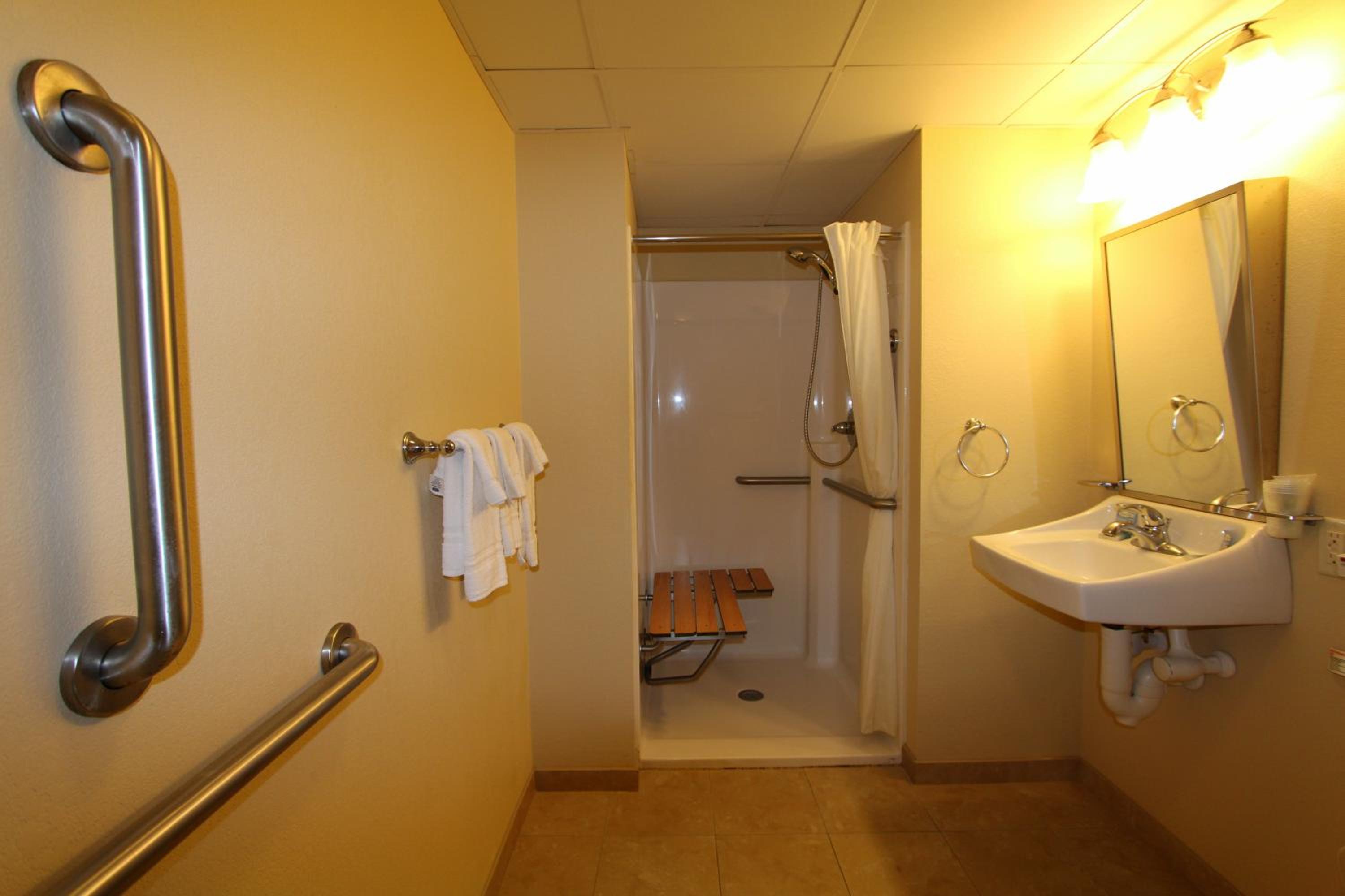Queen Room with Two Queen Beds with Roll in Shower - Photo 2