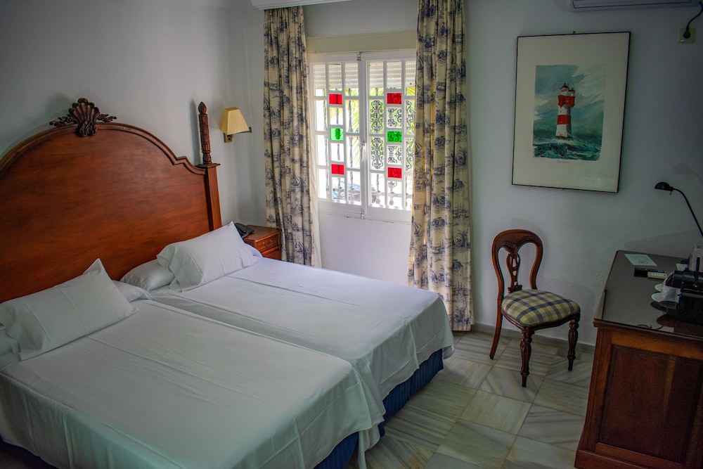 Habitación Doble Estándar o con Dos Camas Individuales.