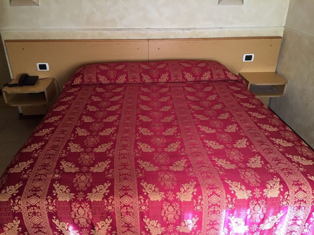 Triple Room (1 Double Bed + 1 Single Bed)