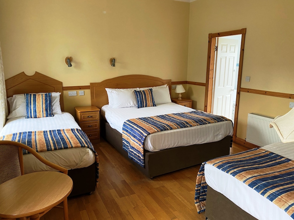 Triple Room (1 Double and 1 Single Bed)