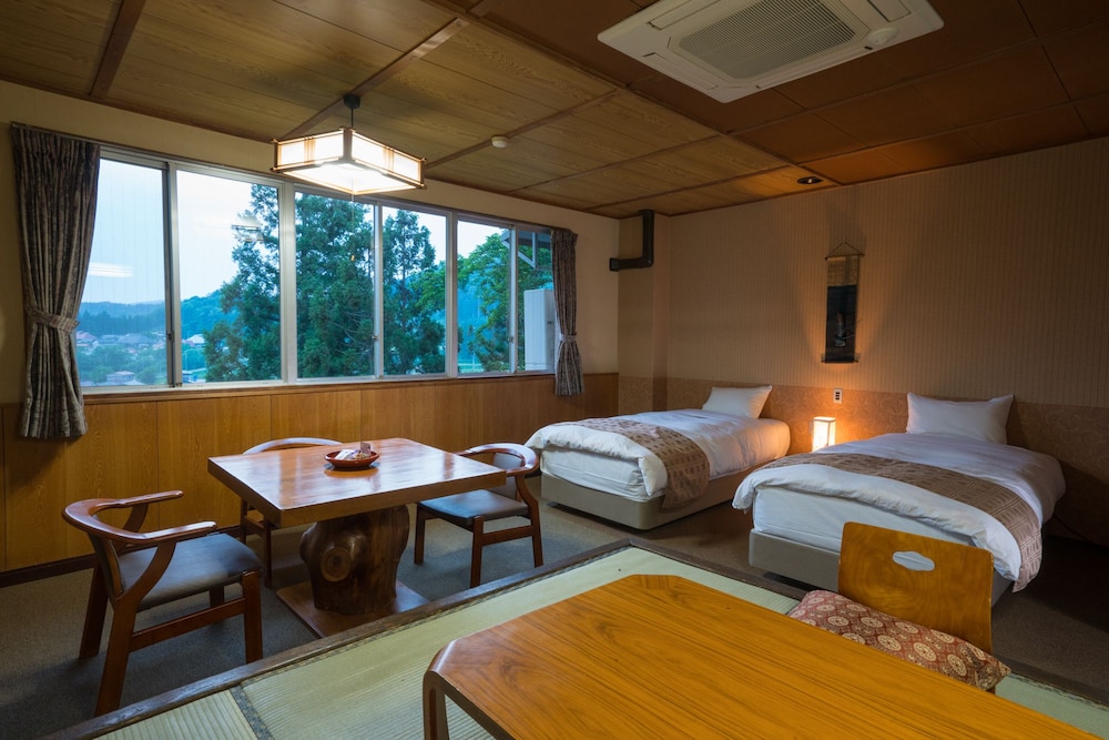 Japanese Western Room OTOMEKAN (2 Single Beds + 4 Japanese Futons), Mountain View photo 1