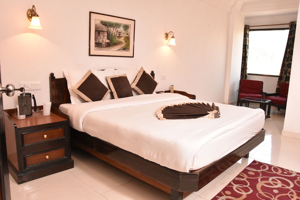 Deluxe Room - Photo 16