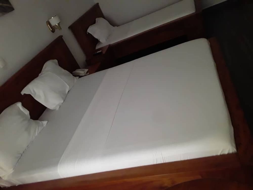 Classic Triple Room, Balcony, Beach View photo 3