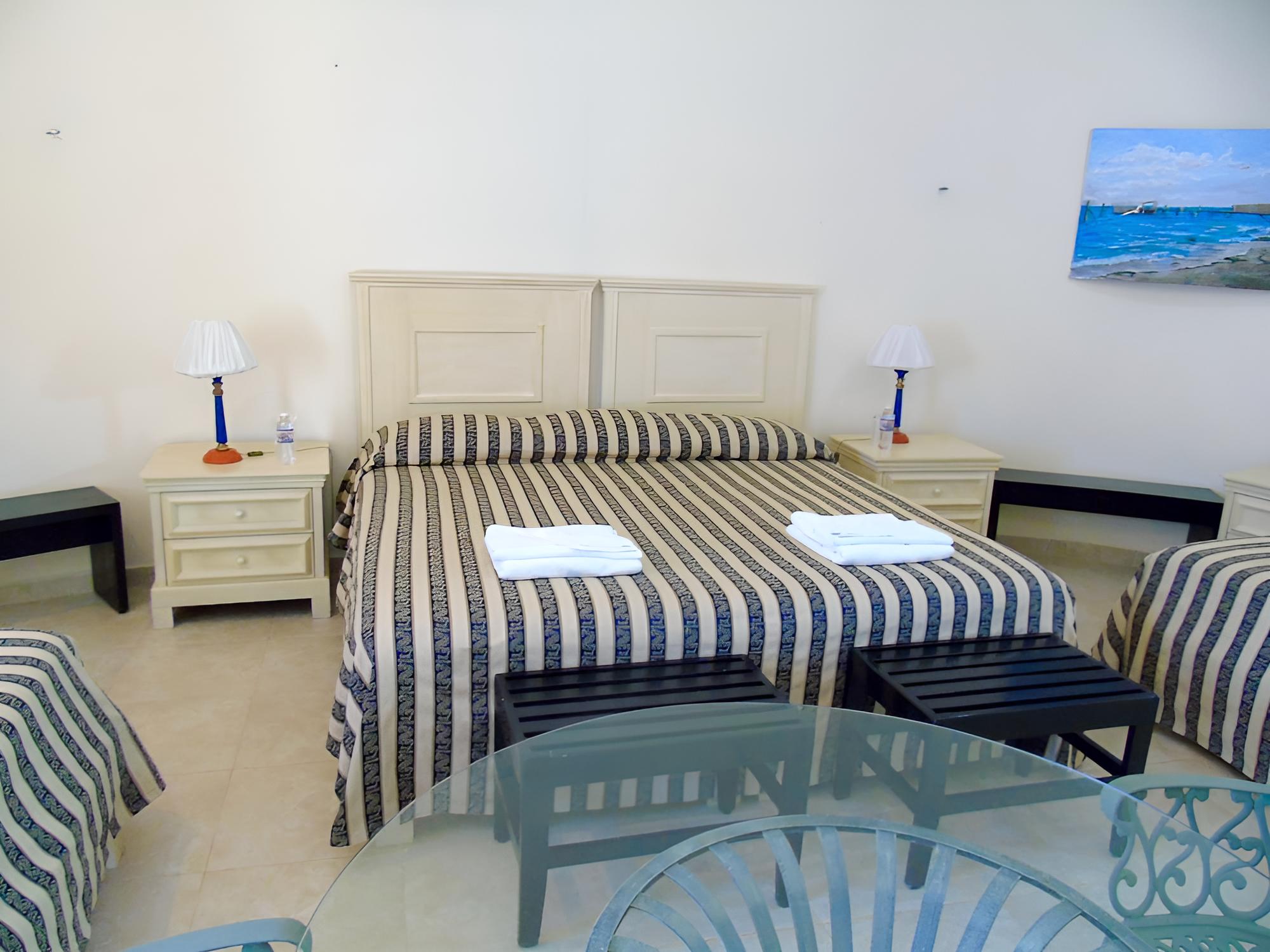Standard Quadruple Room, Garden View photo 3