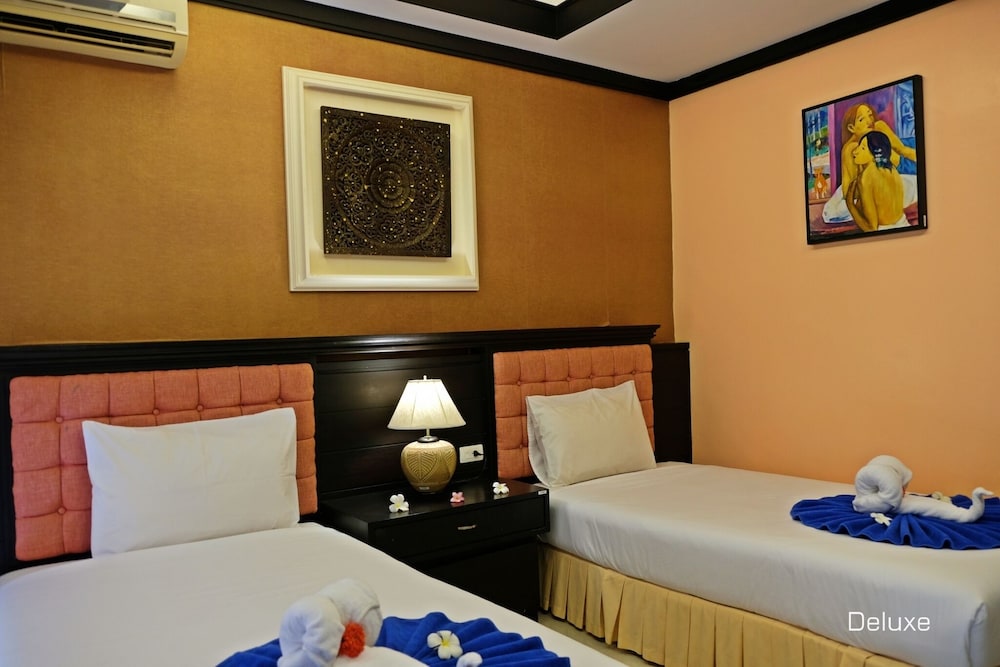 Deluxe Room - Photo 5