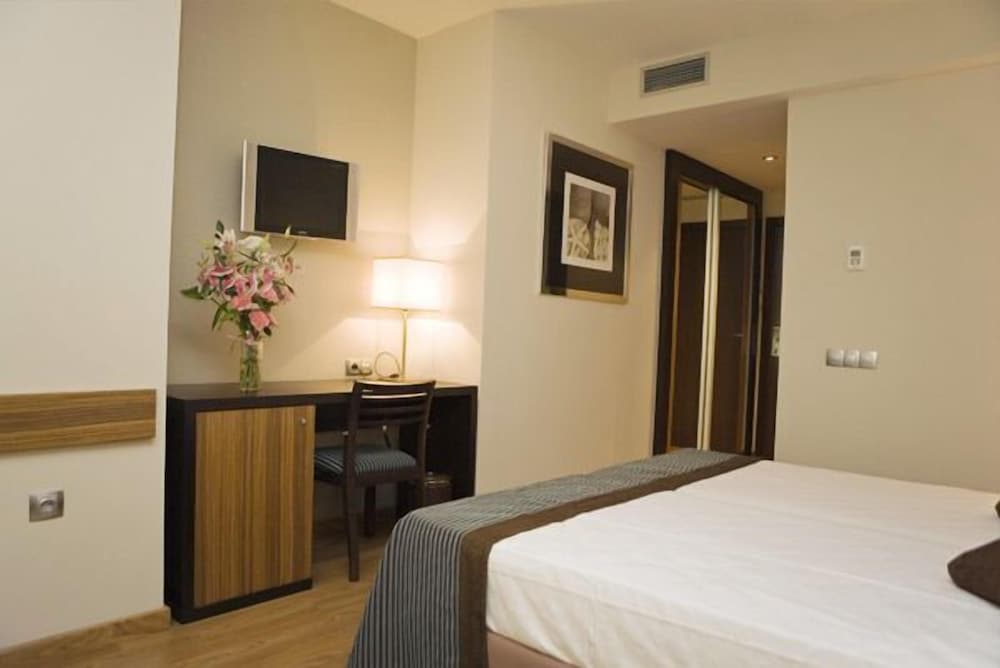 Triple Room (2 adults and 1 child)