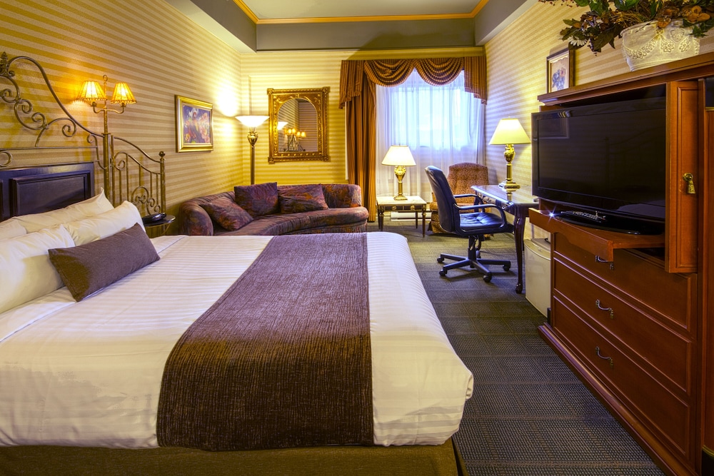 Economy Room, 1 Queen Bed And Single Whirlpool Bath photo 1