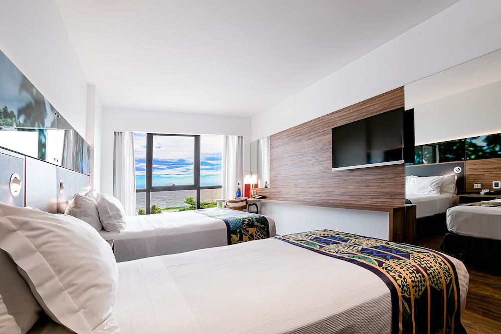 Deluxe Triple Room, Sea View thumbnail 5