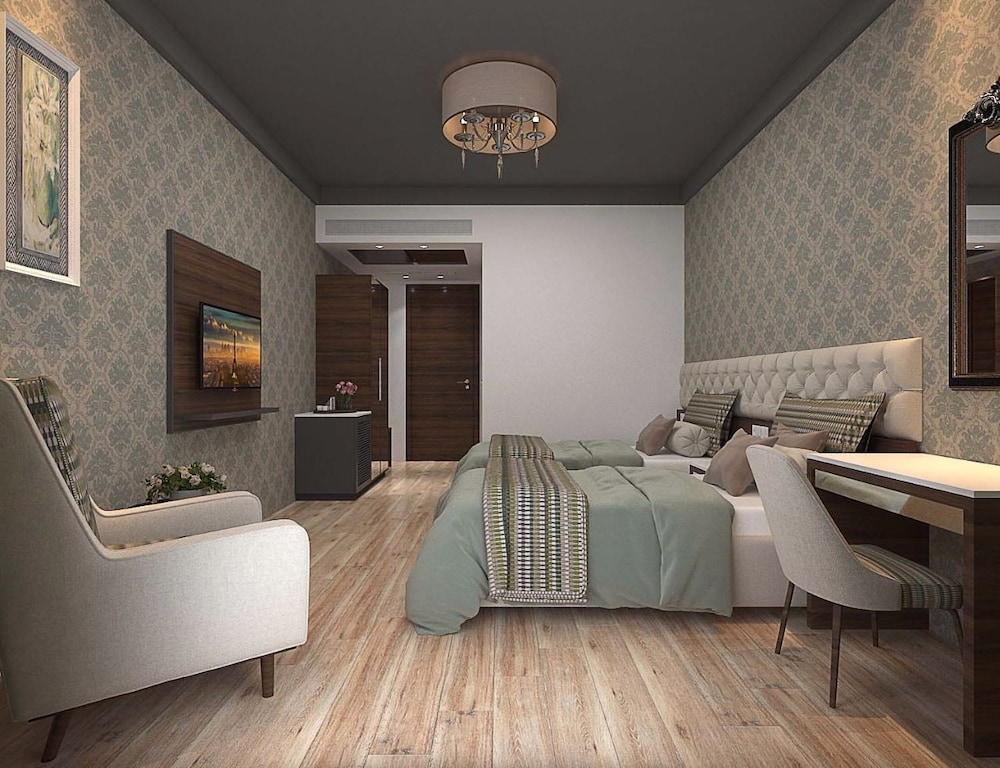 Deluxe Room - Photo 12
