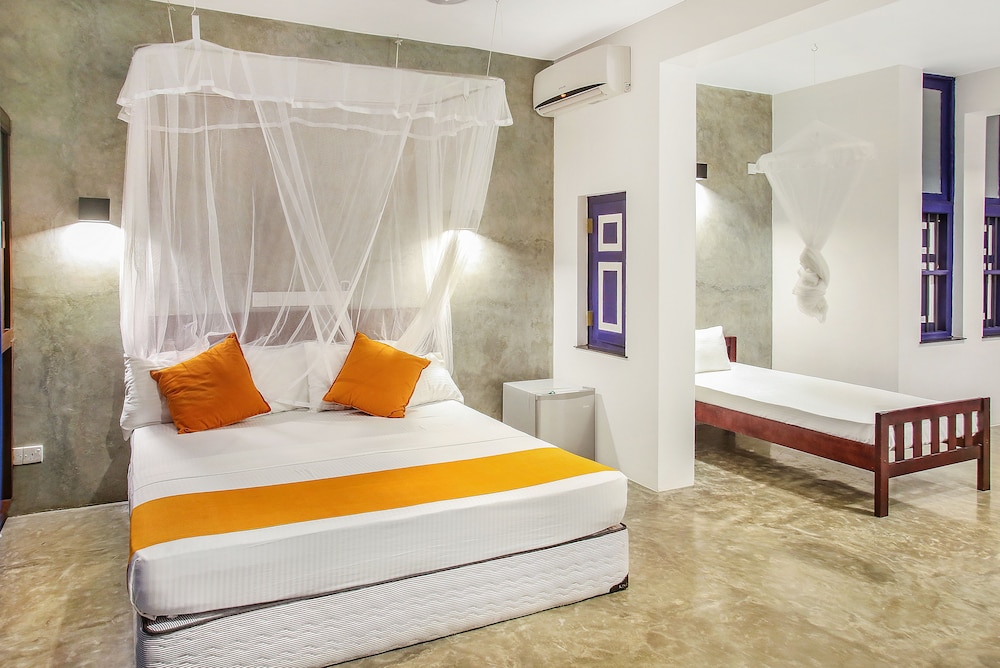 Triple Room, 1 Bedroom, Ocean View, Beachfront photo 1