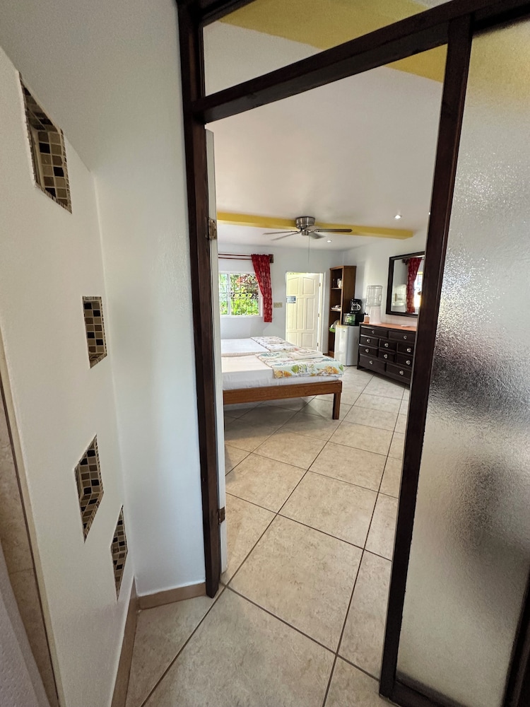 Comfort Room, Multiple Beds, Refrigerator, Courtyard Area photo 3