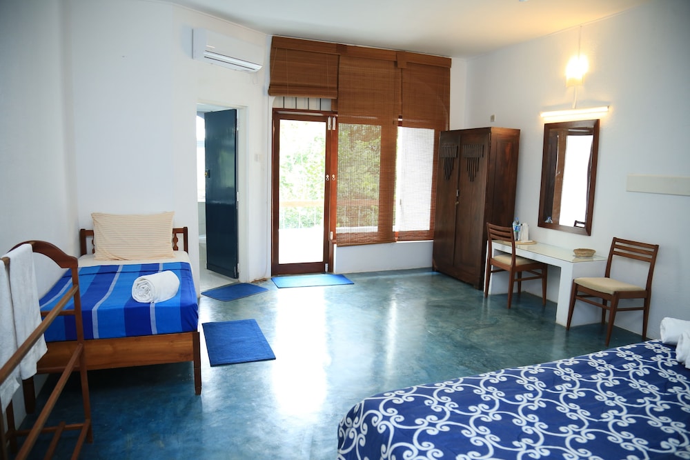 Triple room with garden view