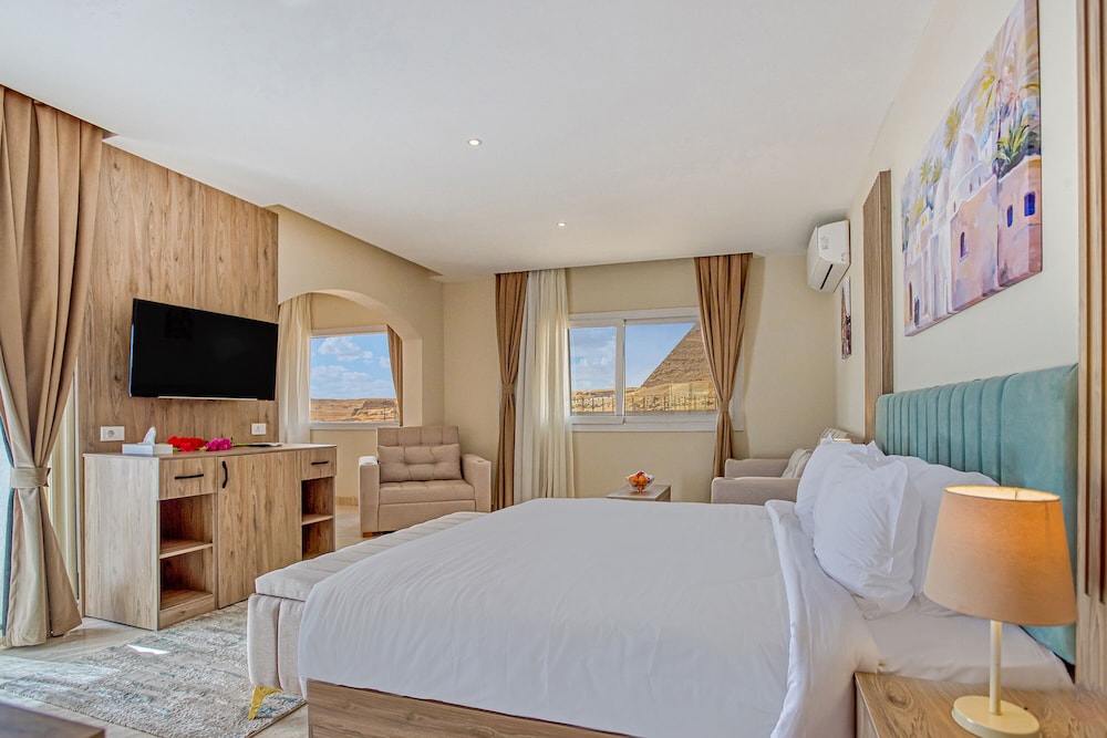 King Suite with Panoramic Pyramids View & Terrace photo 1