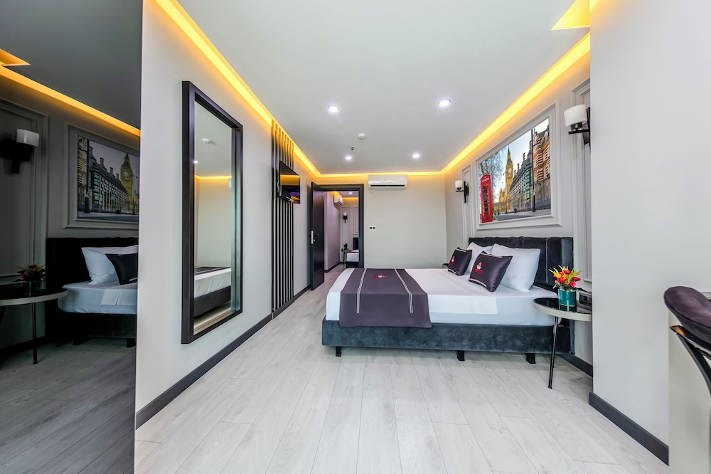 Deluxe Triple Room - Photo 8