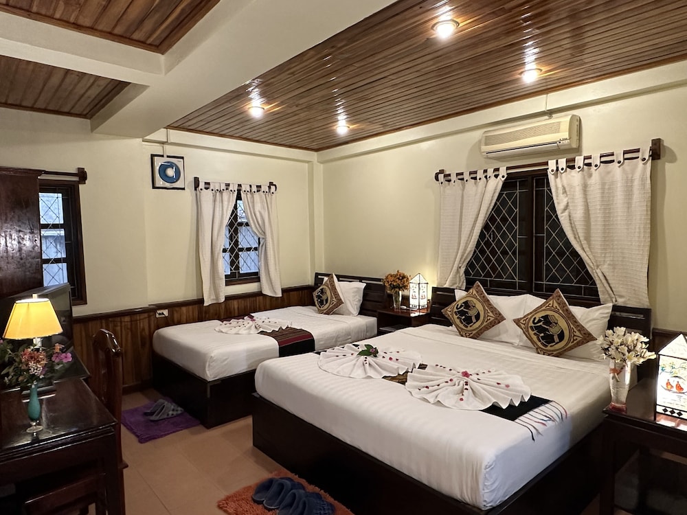 Deluxe Triple Room - Photo 1