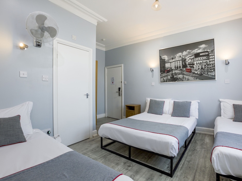 Standard Quadruple Room, Multiple Beds photo 1