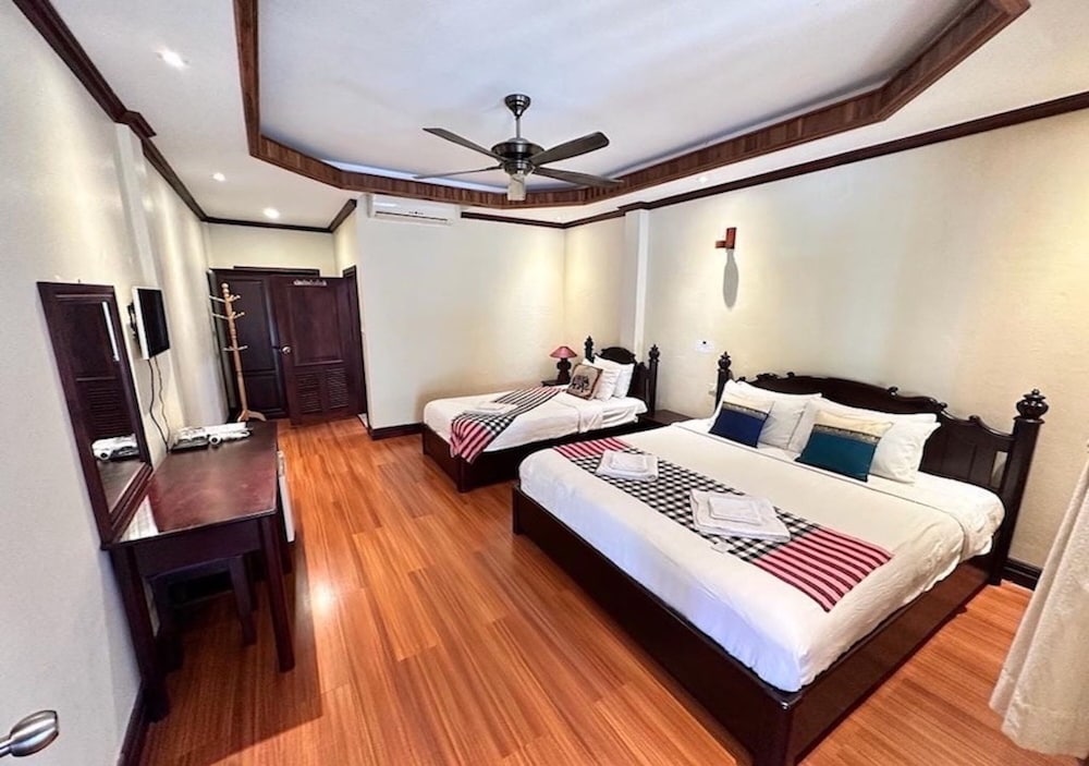 Deluxe Triple Room - Photo 1