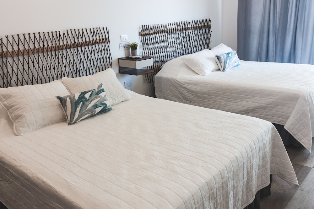 Habitación Doble Deluxe, 2 Camas Queen, Baño Privado, Vista a la Playa