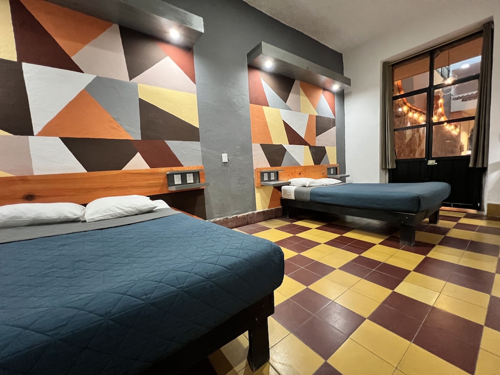 Basic Quadruple Room, 2 Queen Beds, Non Smoking, Shared Bathroom photo 3