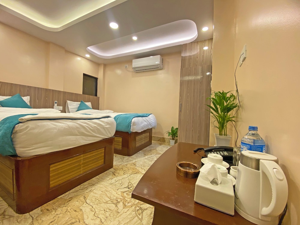 Deluxe Triple Room - Photo 9