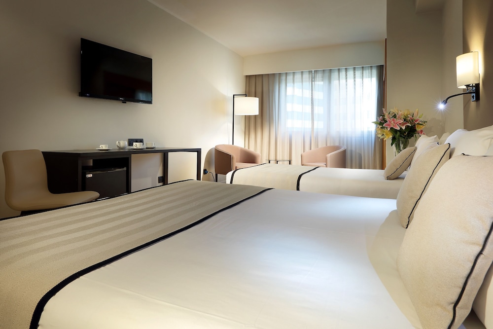 Triple Room (2 Adults + 1 Child) photo 2