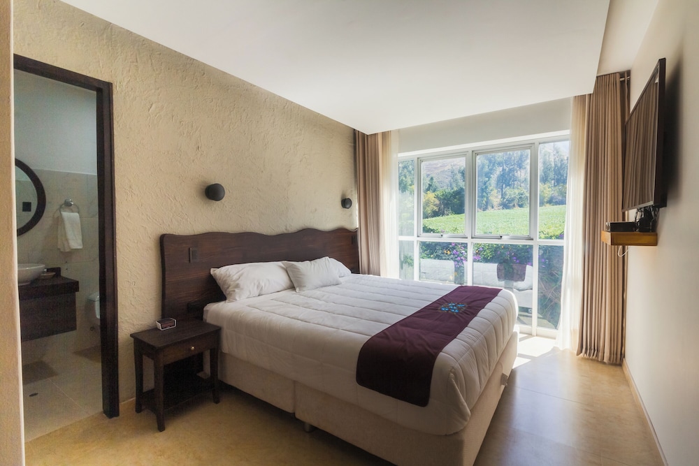 Master Suite with Balcony photo 1