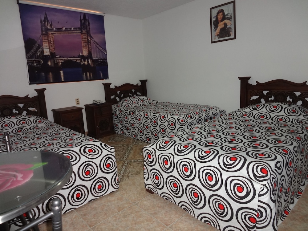 Quadruple Room (With Fan) photo 1