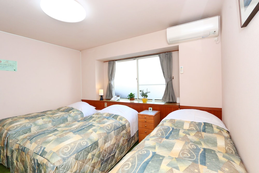Triple Room, Private Toilet, Shared Bathroom photo 1