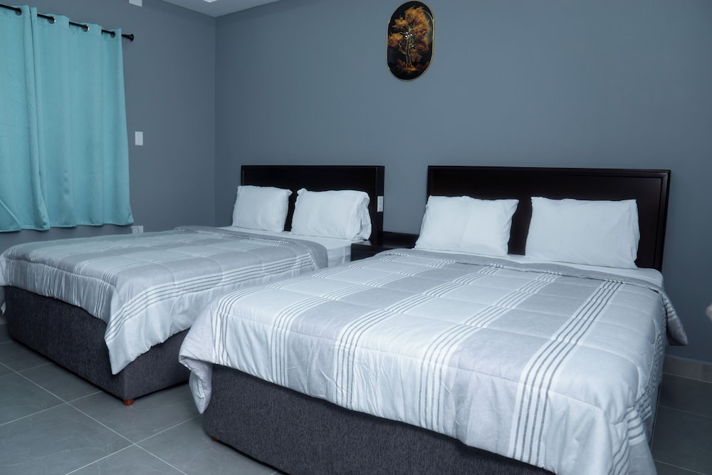 Exclusive Suite, Multiple Beds, Kitchenette, Courtyard View