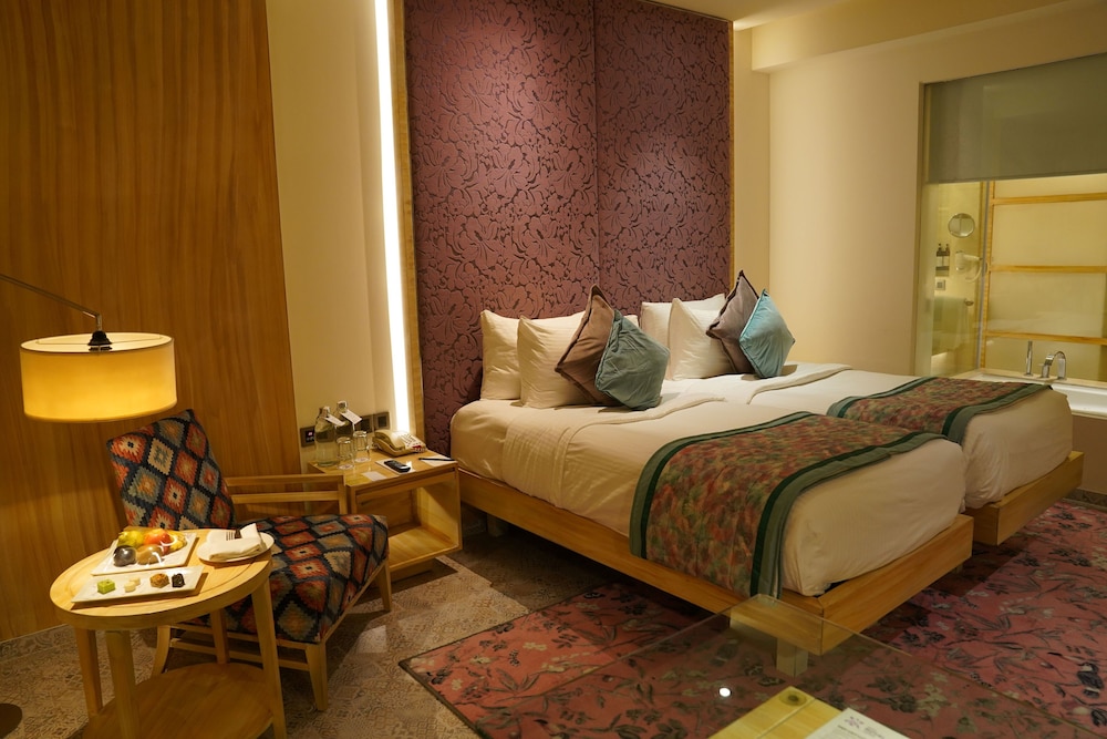 Deluxe Twin Bed with Bath Tub - Photo 1