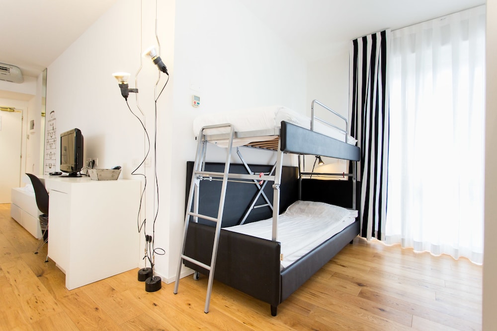 Deluxe Quadruple Room - Photo 21