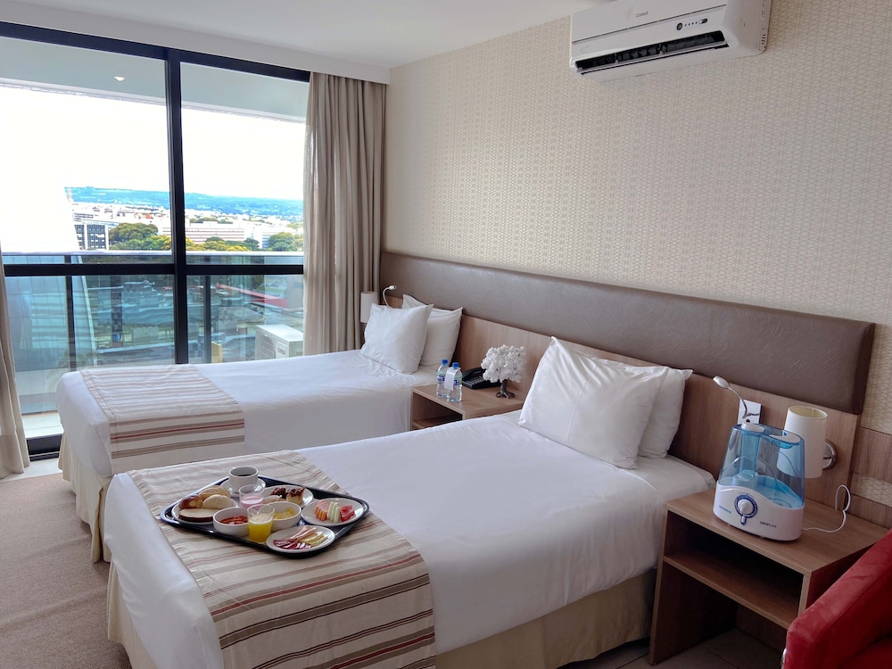 Quarto Executivo Dbl Solteiro Vista cidade